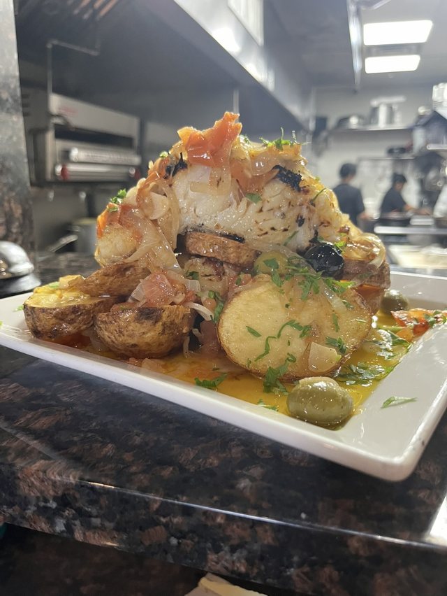 Cod with potatoes, onions & tomato at Churrasqueira Ribatejo
