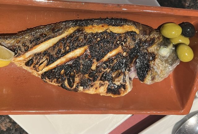 Charcoal-grilled whole fish at Churrasqueira Ribatejo