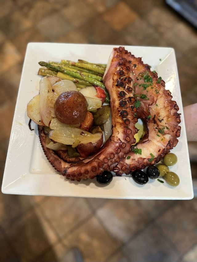 Grilled octopus with roasted vegetables at Churrasqueira Ribatejo